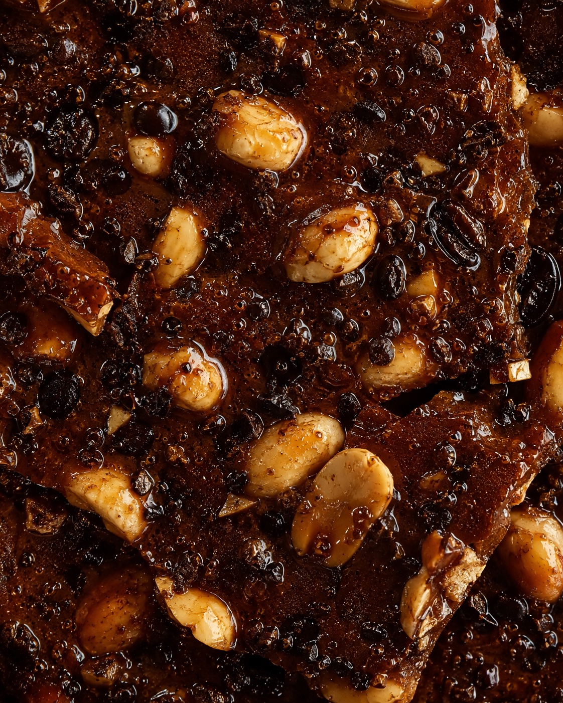 Glossy coffee and peanut brittle macro